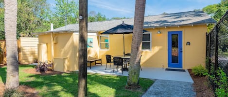 Fun contemporary bohemian art and style adorn this cozy beach bungalow. This home offers fully fenced yard, private drive for parking, and is 5-7 min walking distance from the beach.