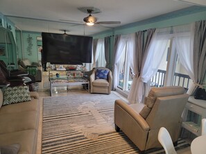 75" TV with surround sound, new leather furniture!!
