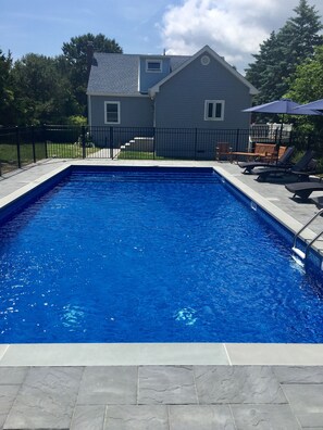 Pool, patio and back of house