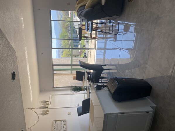 Flooring, Chair, Furniture, Indoors, Living Room