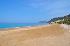 The beach in front of the house direction right