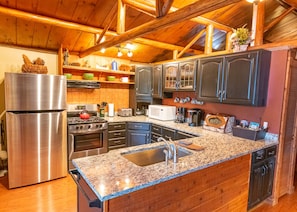 Kitchen includes Keurig and drip coffee machines and dishwasher.