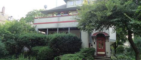 1914 stucco home on quiet tree line street