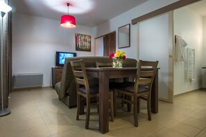 Share meals and laughs at the dining table.