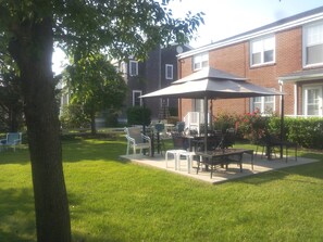 Large Backyard with Gazebo and Lawn Furniture