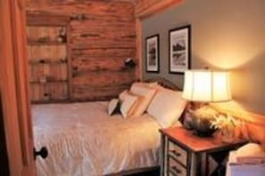 3rd Bedroom off kitchen on 2nd floor, with queen bed, TV, closet, etc.