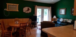 Looking in from the front door, dining and living room area.