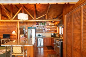 Kitchen with dishwasher, 6 burner stove, drip and Keurig coffee pot & microwave.