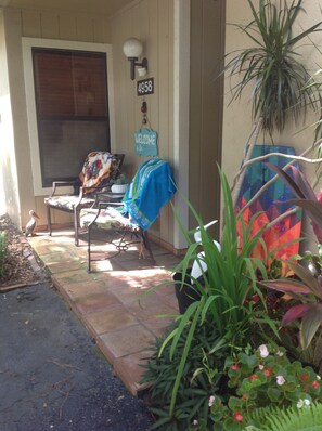 small porch area of condo