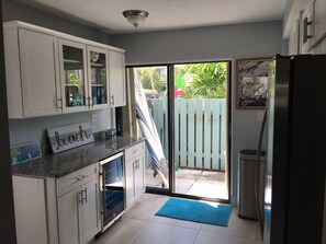 Bar area with wine refrigerator 