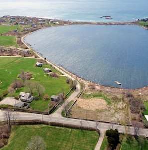 124 Sakonnet Point Road (house and garage on the left corner of photo)