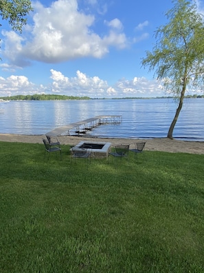 Our beautiful private lakeshore with fire pit-It's such a great place to relax!