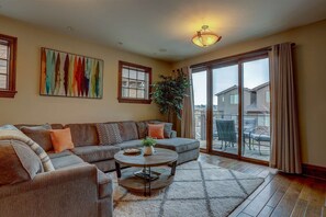 Large sectional sofa in living room, if you can take your eyes off the mountains.