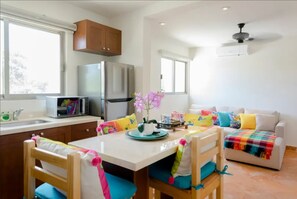 Kitchen and living area with futton