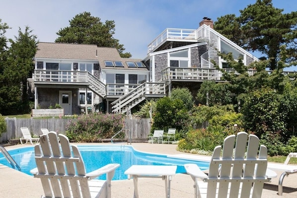 Relaxing poolside with a view of the multi level decks