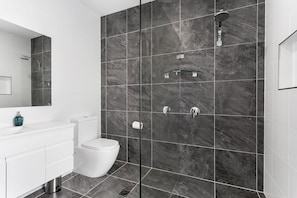 Easy access Master ensuite with walk-in shower. Towels, shampoos and soaps