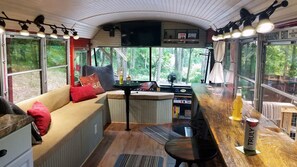 Eat-in bar and dining area. TV with DVDs.