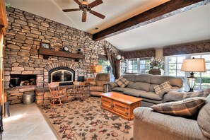 Family Room with TV and wood burning fireplace