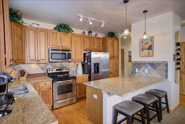 Kitchen. Island leads extra seating for family and friends
