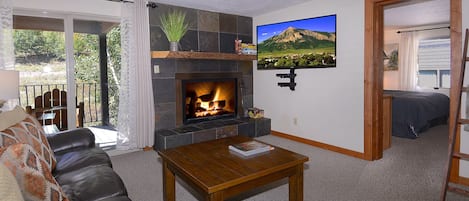 Living room w/wood fireplace