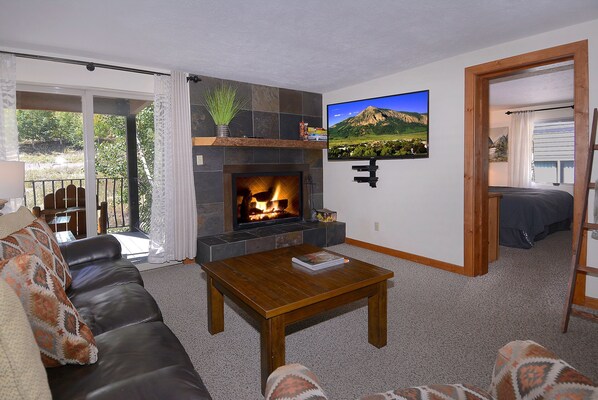 Living room w/wood fireplace