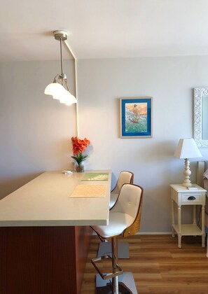 Island for dining and comfortable seating.