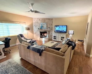 Large Great Room with 65” TV and Ample Seating