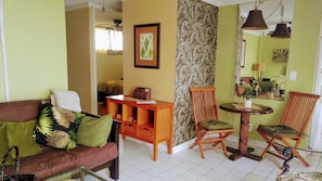 Dining nook, 2 extra chairs available, queen bedroom seen on Left