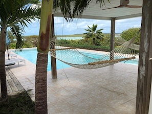 Pool, with views of the sound and covered deck