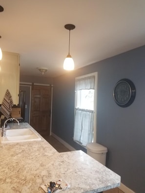 Kitchen, fully stocked with SS appliances and granite countertop