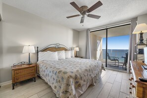 Primary Bedroom with a King Size Bed and Balcony Access