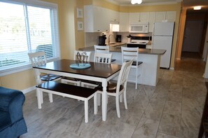 Indoor dining with extra bar seating.