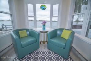 These barrel chairs swivel, so you can face the interior, or view the Bay!