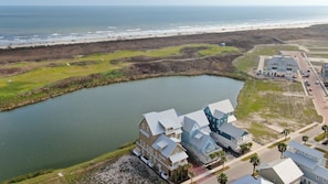 Aerial of the Palace, Lake, Palmilla Golf Course, Dunes, Beach & Gulf of Mexico