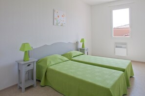 There are 2 bedrooms in this spacious apartment one featuring 2 Single beds and the other with a Double bed.