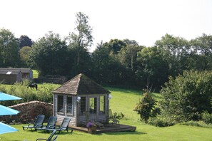 Gardens and Grounds with stunning views of the Sid Valley and beyond