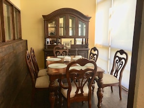 Dining room located between kitchen and living room. Table for 6.