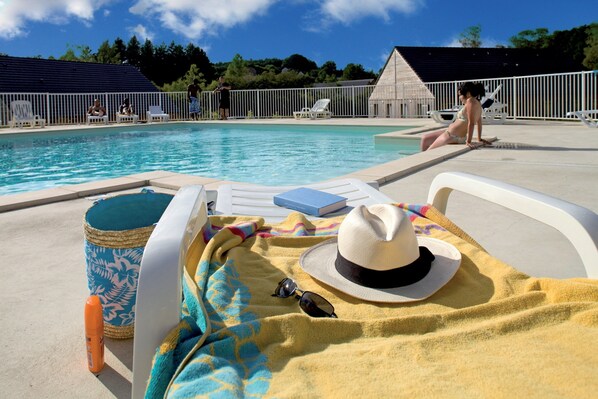 Take in gorgeous views while lounging around the on-site outdoor pool.