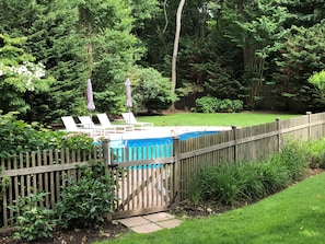 VIEW OF POOL FROM HOUSE