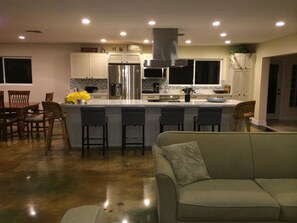 kitchen with large island and new appliances
