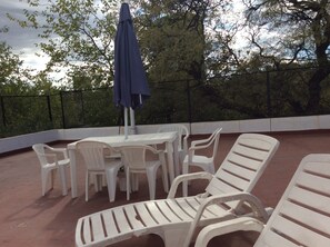 Solarium con piscina