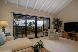 Large flat screen TV with cable and WiFi throughout and amazing ocean view from the living room