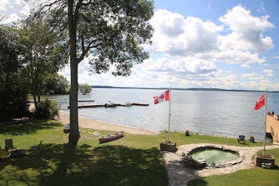 Home of 1000island-Directly on St Lawrence River,private beach free boat docking