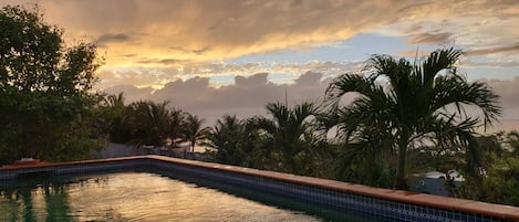 Poolside view at sunset
