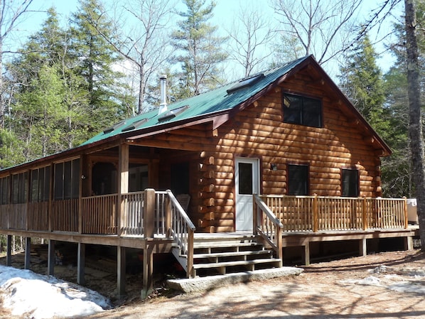 2200 square feet, wrap around deck, and screened porch