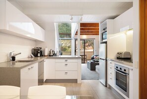 Kitchen through to living area