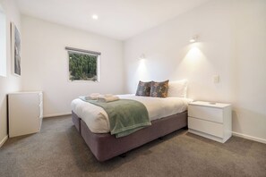 Bedroom one in king bed formation.  Can be split into single beds