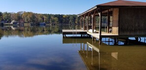 Boathouse, dock with steps to help you go in and out of the lake