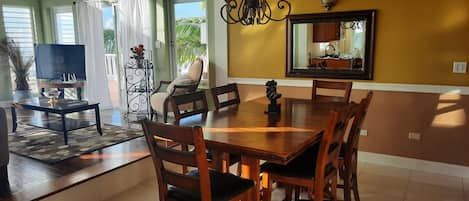 Dining room and living room area opens up to an expansive patio w/amazing views