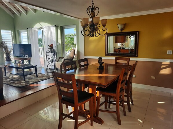 Dining room and living room area opens up to an expansive patio w/amazing views